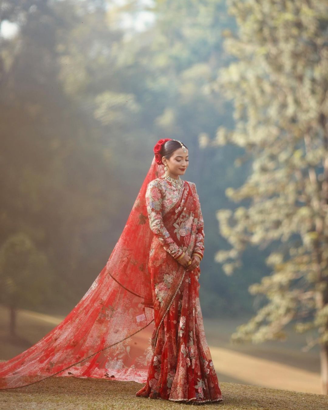 Red Floral Bridal Saree with Net Veil